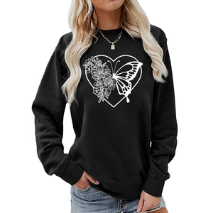 Detailed close-up of heart floral butterfly print on women's crewneck sweatshirt
