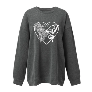 Detail of heart butterfly print on charcoal grey drop shoulder oversized sweatshirt