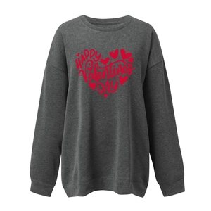 Detail of red heart print and Happy Valentine's Day text on dark grey sweatshirt