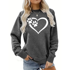 Close-up of a dark grey crewneck sweatshirt featuring a large white heart and paw print pattern