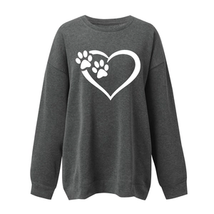 Detail of rib-knit collar and white heart paw print on dark grey crewneck sweatshirt