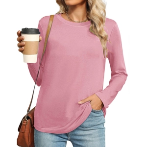 Elegant light pink long sleeve crew neck t-shirt for women in a relaxed casual style
