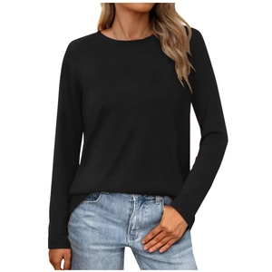 Elegant women's black long sleeve crew neck t-shirt paired with light blue denim jeans