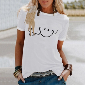 Detail of white cotton T-shirt featuring black smile print and crew neck design