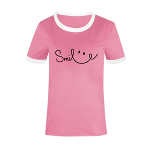 Detail of pink t-shirt featuring contrast white ribbed collar and black Smile print