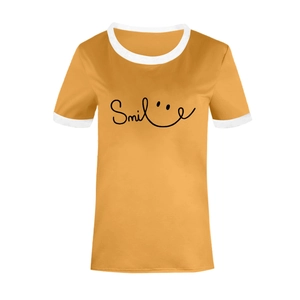 Detailed shot of the mustard yellow ringer T-shirt with black smile print and white neckline
