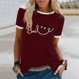 Detail of burgundy t-shirt with smile print, white trim on crew neck and sleeves