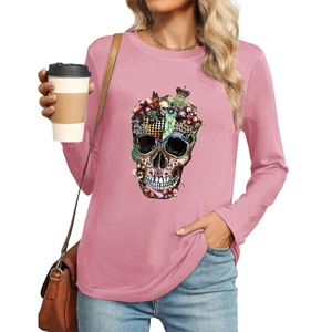 Detail of pink long sleeve Gothic tee featuring floral skull print and smooth fabric