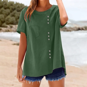 Detail view of dark green short sleeve top with button trim and chest pocket