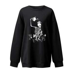 Close-up of white skeleton watering plants print on black drop-shoulder sweatshirt