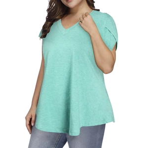Detail of mint green V-neck T-shirt showing lightweight textured fabric and loose A-line hem
