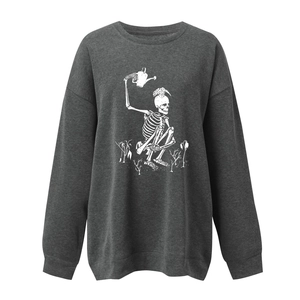 Detail of skeleton watering plants print on a charcoal grey long sleeve sweatshirt