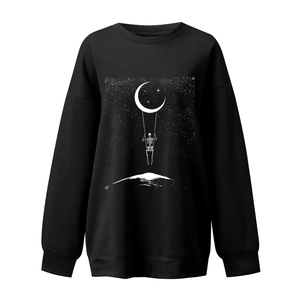 Detail of skull on a moon swing print on black drop-shoulder sweatshirt for women