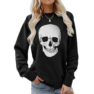 Detailed view of the large white skull print on a black crewneck sweatshirt for women