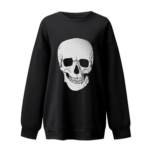 Detailed view of the rib-knit cuff and high-quality skull print on black sweatshirt