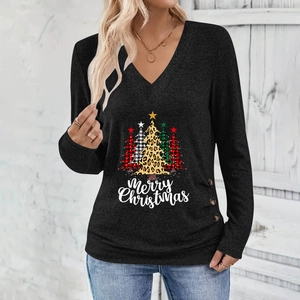 Close-up of V-neck shirt with Christmas tree prints and decorative side buttons