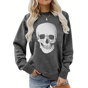 Detail of dark grey crewneck sweatshirt featuring a large white skull print and drop shoulders