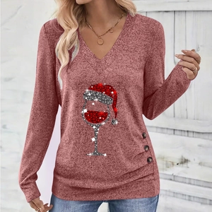 Detail of V-neck long sleeve top in dusty rose with wine glass print and side buttons