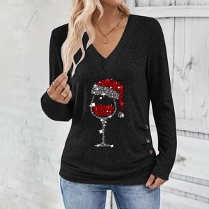 Close-up of V-neck long sleeve top featuring Christmas wine glass print and side buttons