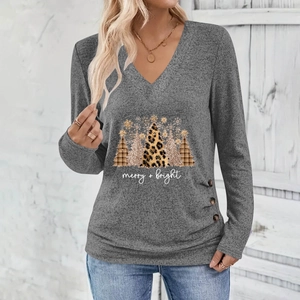 Detail of Christmas tree graphics and button trim on a grey V-neck long sleeve tee