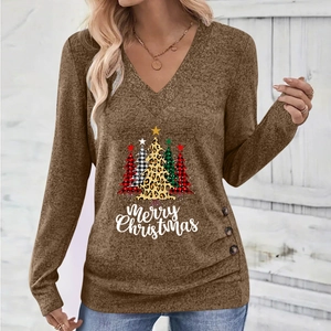 Detail of V-neck long sleeve top with Christmas tree print and side buttons decorative hem