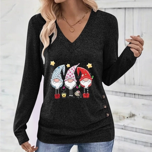 Detail view of V-neck top showing Santa gnomes print and side button accents on black fabric