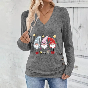 Close-up of decorative wooden buttons and festive gnome print on grey V-neck long sleeve top
