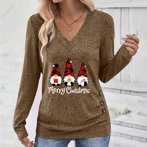 Detail of Christmas gnomes print and side buttons on brown V-neck long sleeve top