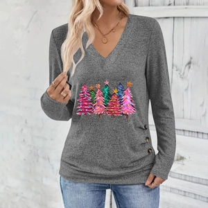 Detail of V-neck long sleeve top with festive Christmas tree print and side wood buttons