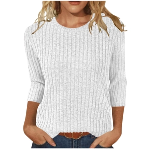 Close-up of elegant white ribbed knit texture and round neck design on this women's T-shirt