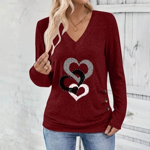 Elegant V-neck long sleeve burgundy top featuring triple heart prints and side button details
