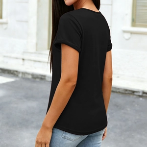 Detail of a black short sleeve T-shirt featuring fixed rolled cuffs and a soft knit fabric
