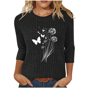 Women's black rib-knit tunic with white dandelion butterfly print and 3/4 sleeves