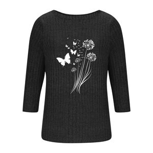 Detailed view of the ribbed fabric texture with dandelion and butterfly print