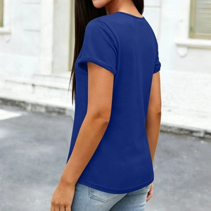 Detail of royal blue short sleeve top with stylish cuffed sleeves and soft fabric texture