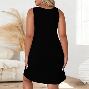 Detail view of the sleek racerback design and soft knitted fabric of this black summer dress