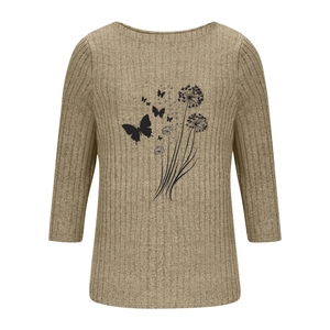 Detail of khaki ribbed knit top featuring a black dandelion and butterfly graphic print