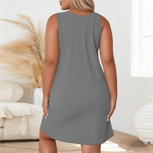 Rear view of a grey sleeveless nightdress in a cozy home setting showing soft knit fabric