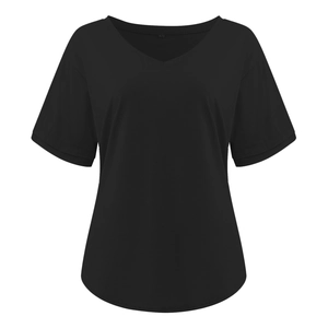 Close-up of V-neckline and printed size label on minimalist black cotton short sleeve T-shirt