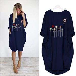 Navy blue long sleeve crew neck dress with floral print and large side pockets