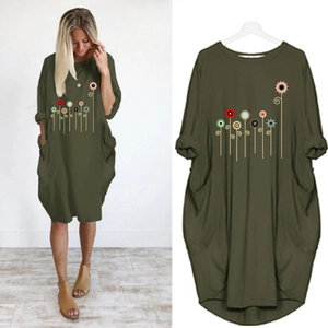Olive green loose-fit dress with crew neck, floral print, and large side pockets
