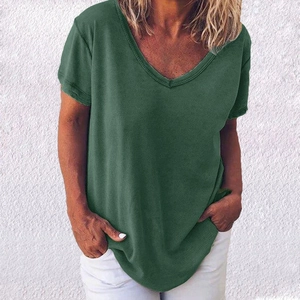 Detail of loose fit dark green V-neck T-shirt showing breathable fabric texture and stitching