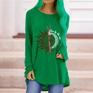 Detail of loose fit emerald green long sleeve shirt with sunflower mandala graphic