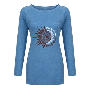 Detail of blue long sleeve tee showing sun and moon print with Live by the sun text