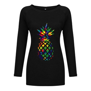 Close-up of vibrant tie-dye pineapple print and size M label on women long sleeve T-shirt