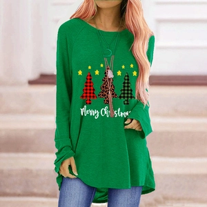 Detail of Christmas tree prints and Merry Christmas lettering on green long sleeve shirt
