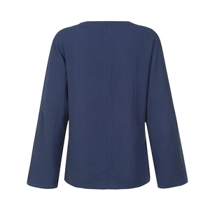 Detail view of the vertical fabric texture and back seam on this dark blue linen shirt