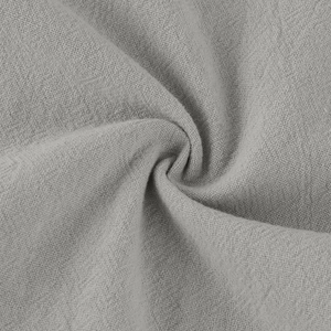 Detailed macro view of gray cotton linen fabric texture with natural weave pattern