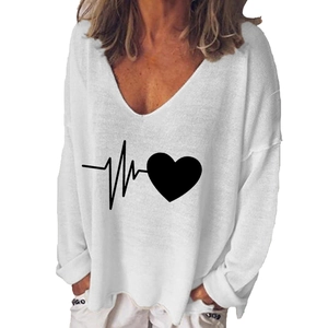 Close-up of white V-neck long sleeve T-shirt with black heart heartbeat pattern detail