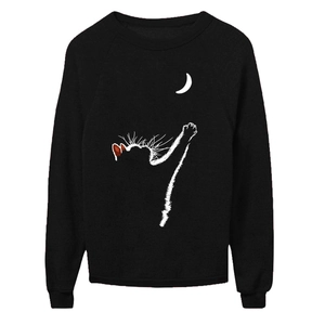 Detail of white cat silhouette and crescent moon print on black crewneck sweatshirt
